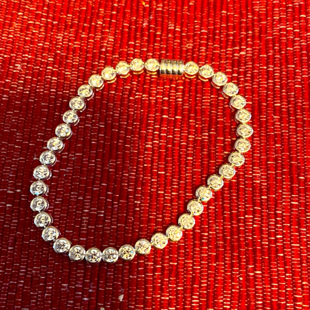 Sterling silver/cz tennis bracelet…New